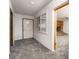 Bright entryway with grey carpet, showing a view to the living room at 3759 Glen Ave, Las Vegas, NV 89121