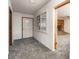 Bright entryway with grey carpet, showing a view to the living room at 3759 Glen Ave, Las Vegas, NV 89121