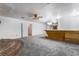 Living room with wood bar and grey carpet at 3759 Glen Ave, Las Vegas, NV 89121