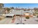 Single story home with carport and front yard at 3766 Millwood Ave, Las Vegas, NV 89121