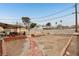 Large backyard with brick pathway and open space at 3766 Millwood Ave, Las Vegas, NV 89121