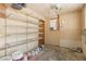 Unfinished basement with wire shelving and ample storage space at 3766 Millwood Ave, Las Vegas, NV 89121