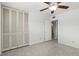 Well-lit bedroom with double door closet and ceiling fan at 3766 Millwood Ave, Las Vegas, NV 89121