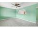 Living room with an archway opening to another room and a ceiling fan at 3766 Millwood Ave, Las Vegas, NV 89121