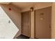 Beige apartment entrance includes security door with welcome sign on front door at 3800 Desert Marina Dr # 158, Laughlin, NV 89029