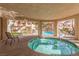 Relaxing hot tub with seating area and covered patio at 3800 Desert Marina Dr # 158, Laughlin, NV 89029