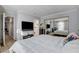 Bright bedroom with a view of the bathroom and hallway at 4050 Pacific Harbors Dr # 201, Las Vegas, NV 89121