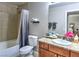 Clean bathroom with granite vanity and tub shower combo at 4200 S Valley View Blvd # 2081, Las Vegas, NV 89103