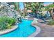 Relaxing kidney-shaped pool with a rock waterfall feature at 4200 S Valley View Blvd # 2081, Las Vegas, NV 89103