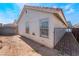 Side yard with block wall, small gate and open space at 424 Sarajane Lane, Las Vegas, NV 89107