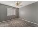 Spacious bedroom featuring a ceiling fan and neutral wall tones at 424 Sarajane Lane, Las Vegas, NV 89107