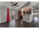 Open living room with kitchen and sliding door access to backyard at 424 Sarajane Lane, Las Vegas, NV 89107