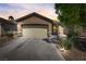 Single-story home with attached two-car garage and desert landscaping at 448 Bright Moon Ave, North Las Vegas, NV 89084