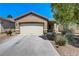 Single-car garage with driveway at 448 Bright Moon Ave, North Las Vegas, NV 89084