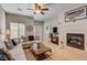 Bright living room with fireplace and comfortable seating at 448 Bright Moon Ave, North Las Vegas, NV 89084