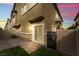 Private backyard with artificial turf and patio at 4625 Ridgeley Ave # 103, North Las Vegas, NV 89084