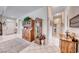 Bright hallway showcases tiled flooring, a decorative cabinet, and a clear view of the home's layout at 471 Eagle Vista Dr, Henderson, NV 89012