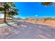 Scenic street view with mature trees under a beautiful clear blue sky at 471 Eagle Vista Dr, Henderson, NV 89012