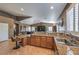 Well-designed kitchen featuring a breakfast bar with seating, open to the living area at 5635 Exotic Rosette Ave, Las Vegas, NV 89139