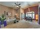 Spacious living room with vaulted ceilings and a neutral color palette at 5635 Exotic Rosette Ave, Las Vegas, NV 89139