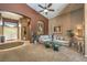 Inviting living room featuring high ceilings, a ceiling fan, and comfortable seating at 5635 Exotic Rosette Ave, Las Vegas, NV 89139