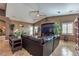 Cozy living room features recessed lighting, stylish decor, and open floor plan at 5635 Exotic Rosette Ave, Las Vegas, NV 89139