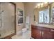 Bright bathroom with a walk-in shower, toilet and modern vanity at 583 Saint Croix St, Henderson, NV 89012