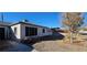 Ranch style home with gravel yard and mature tree at 612 Essex East Dr, Las Vegas, NV 89107