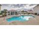 Community pool with a relaxing patio area at 6201 E Lake Mead Blvd # 238, Las Vegas, NV 89156