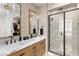 Modern bathroom with double vanity and walk-in shower at 671 Sentinel Spire St, Las Vegas, NV 89138