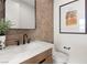 Stylish powder room with hexagon tile and modern vanity at 671 Sentinel Spire St, Las Vegas, NV 89138