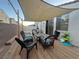 Relaxing backyard patio with shade cover at 6842 Laguna Blanca St, North Las Vegas, NV 89086