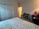 Main bedroom with polka dot bedding and closet at 6842 Laguna Blanca St, North Las Vegas, NV 89086