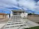 Backyard with covered deck and staircase at 7237 William Anders Ave, Las Vegas, NV 89145