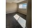 Neutral bedroom featuring a window with carpet at 7237 William Anders Ave, Las Vegas, NV 89145