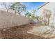 Backyard with gravel and a block wall for privacy at 7239 Proud Patriot St, Las Vegas, NV 89148