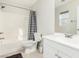 Clean bathroom with a bathtub, toilet and vanity at 7239 Proud Patriot St, Las Vegas, NV 89148