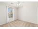 Well-lit bedroom with a window and ceiling fan at 7239 Proud Patriot St, Las Vegas, NV 89148