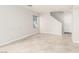 Living room with tile floors and stairway to second floor at 7239 Proud Patriot St, Las Vegas, NV 89148