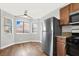 Bright dining area with wood flooring and large windows at 733 Rock Springs Dr # 201, Las Vegas, NV 89128