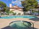 Community pool and spa with ample deck space at 733 Rock Springs Dr # 201, Las Vegas, NV 89128