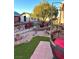 Landscaped backyard with fire pit and patio seating at 7415 Constantinople Ave, Las Vegas, NV 89129