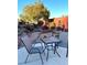 Landscaped backyard with fire pit and patio seating at 7415 Constantinople Ave, Las Vegas, NV 89129