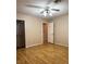 Bedroom with ceiling fan, laminate wood flooring, and lots of natural light at 7415 Constantinople Ave, Las Vegas, NV 89129