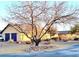 Ranch style home with attached garage and mature trees at 7415 Constantinople Ave, Las Vegas, NV 89129