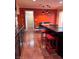 Kitchen with island and red tile floor at 7415 Constantinople Ave, Las Vegas, NV 89129