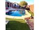 Inviting kidney-shaped pool with a water feature at 7415 Constantinople Ave, Las Vegas, NV 89129