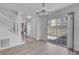 Dining room with hardwood floor, chandelier and patio access at 7933 Delbonita Ave, Las Vegas, NV 89147