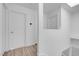 Bright hallway with doors to bedrooms at 7933 Delbonita Ave, Las Vegas, NV 89147