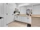 Elegant bathroom with double vanity and granite countertops at 8044 Edward Baher Ave, Las Vegas, NV 89149